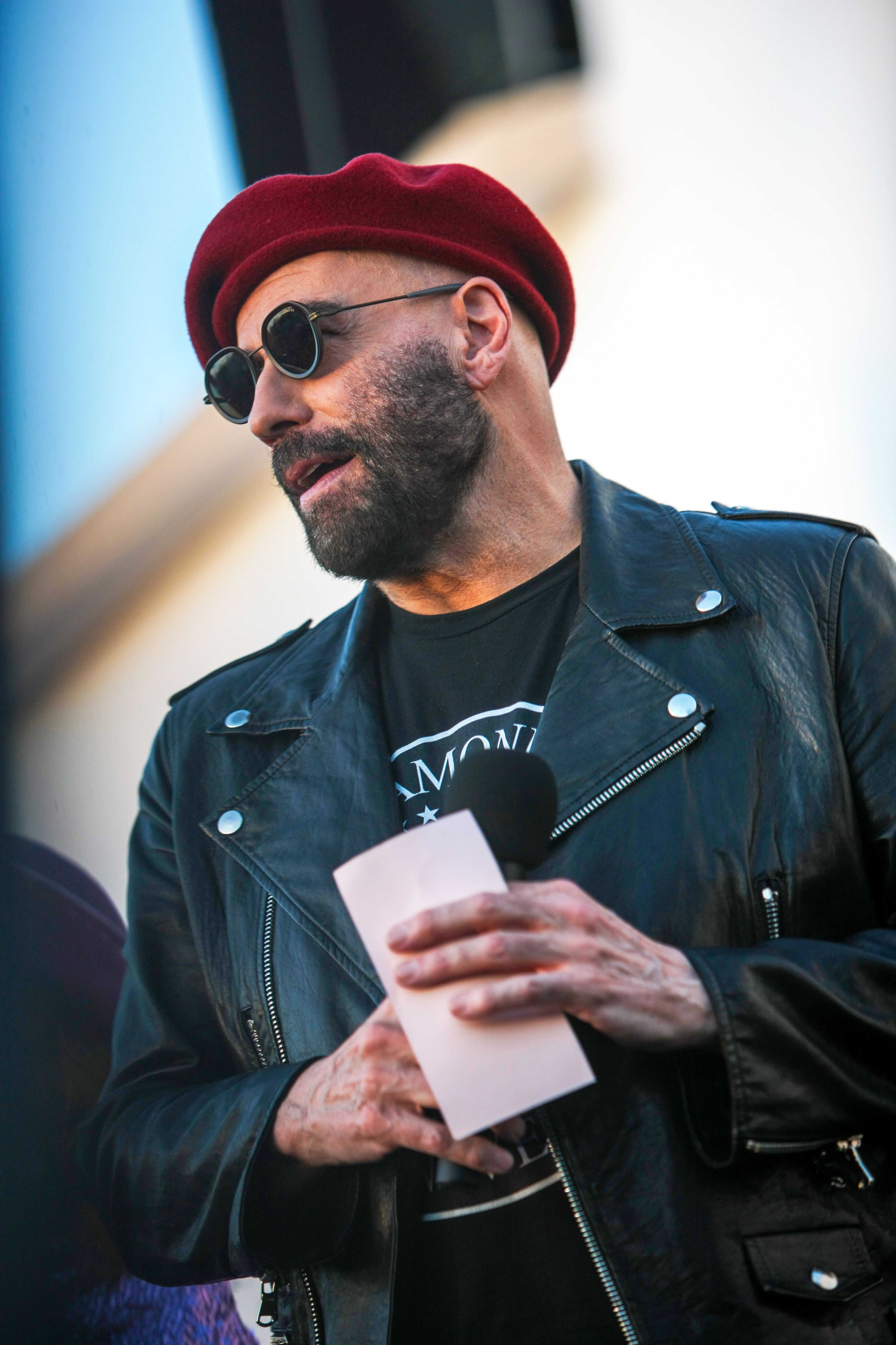 John Travolta Paired His Latest Beret With a Punk Leather Jacket