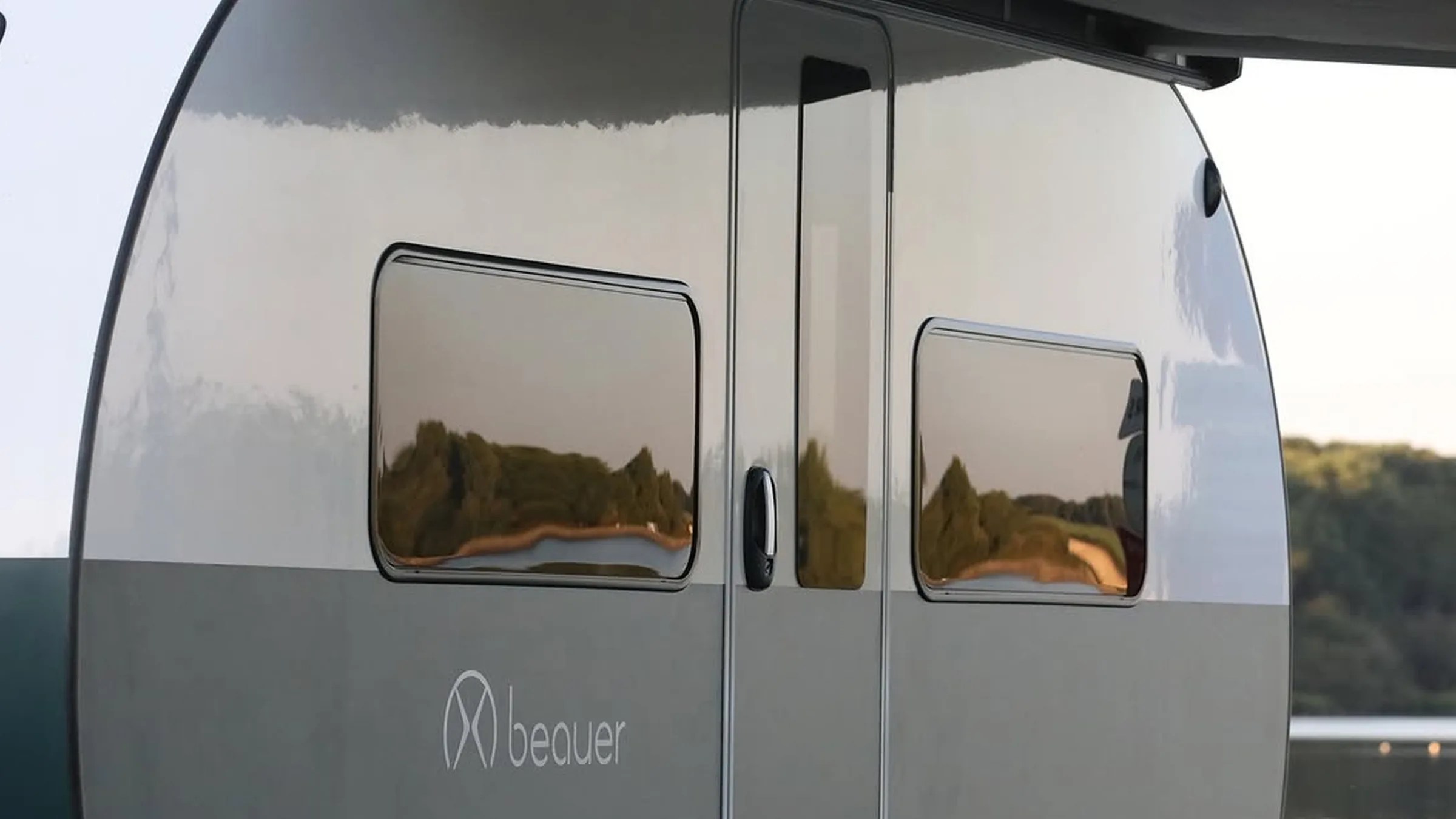 This Clever Expanding Camper Trailer Triples Its Size to Make Room for 8