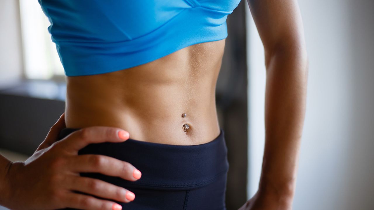 Forget crunches — this standing move trains your core and hip flexors and improves posture at the same time